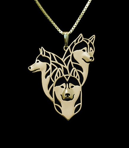 Collana con tre pendenti teste